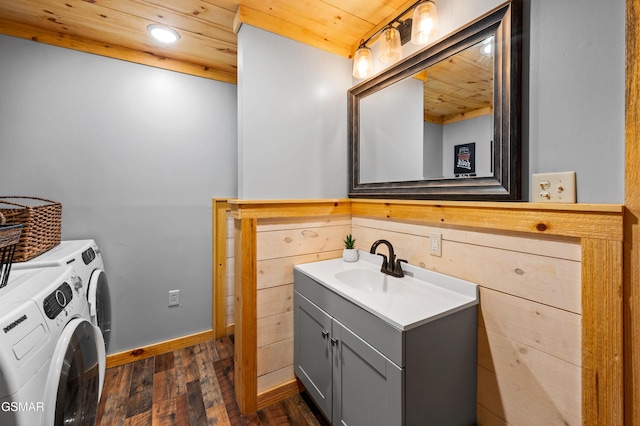 519 Mcmahan Rd, Pigeon Forge, TN 37863 - bathroom featuring independent washer and dryer, wood finished floors, vanity, wood ceiling, and recessed lighting