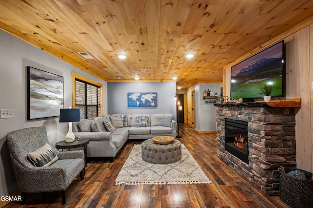519 Mcmahan Rd, Pigeon Forge, TN 37863 - living area featuring dark wood finished floors, a fireplace, and wooden ceiling