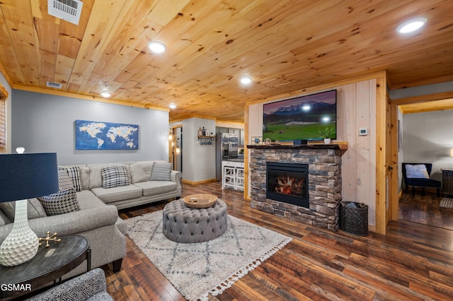 519 Mcmahan Rd, Pigeon Forge, TN 37863 - living area featuring wood finished floors, a stone fireplace, recessed lighting, and wood ceiling
