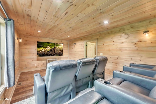home theater room featuring wooden walls, wooden ceiling, recessed lighting, and wood finished floors