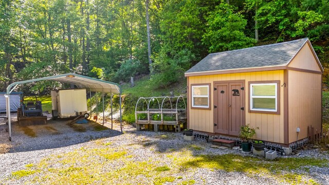 1878 Omaha Rd, Del Rio, TN 37727 - view of shed with a detached carport and gravel driveway