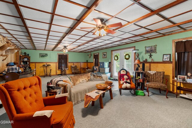1878 Omaha Rd, Del Rio, TN 37727 - living area featuring carpet, ceiling fan, wainscoting, and wood walls