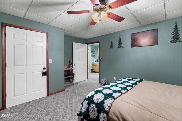 1878 Omaha Rd, Del Rio, TN 37727 - bedroom featuring light carpet, a paneled ceiling, a ceiling fan, and baseboards