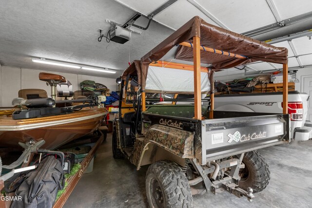 1878 Omaha Rd, Del Rio, TN 37727 - garage featuring a garage door opener