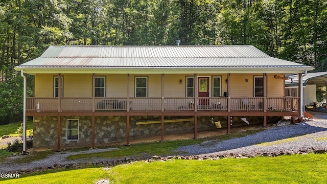 1878 Omaha Rd, Del Rio, TN 37727 - country-style home with metal roof, a porch, a carport, and a front yard
