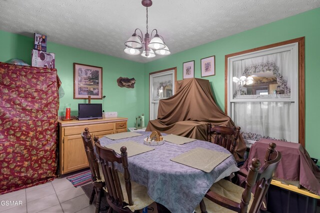 1878 Omaha Rd, Del Rio, TN 37727 - dining room with a chandelier, a textured ceiling, and light tile patterned flooring