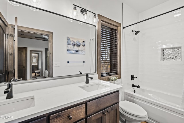 full bathroom with vanity, shower / bathtub combination, and toilet