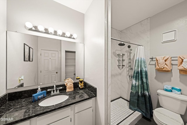 bathroom with a shower with shower curtain, vanity, and toilet