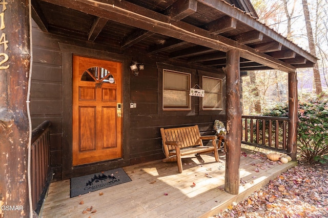 entrance to property with a porch