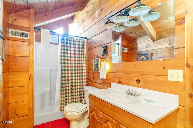 bathroom with vanity, wooden walls, beamed ceiling, and wooden ceiling