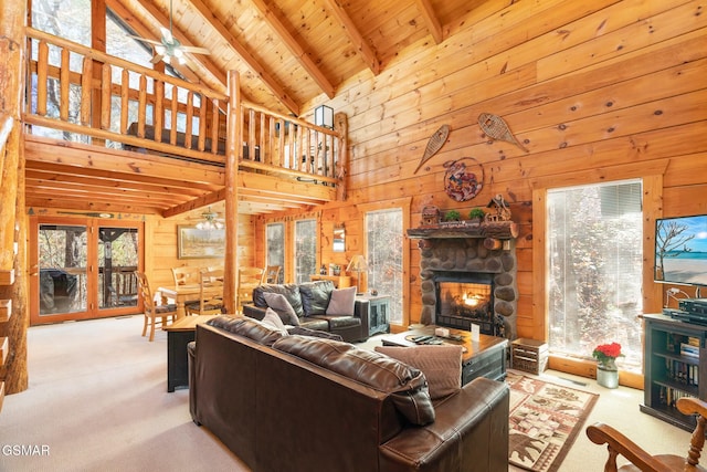 living room featuring light carpet, a fireplace, wood ceiling, high vaulted ceiling, and beamed ceiling