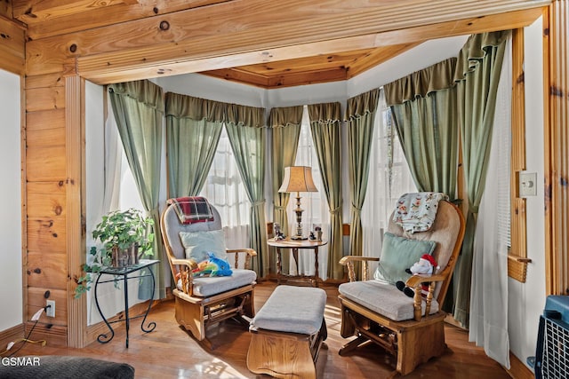sitting room featuring wood finished floors