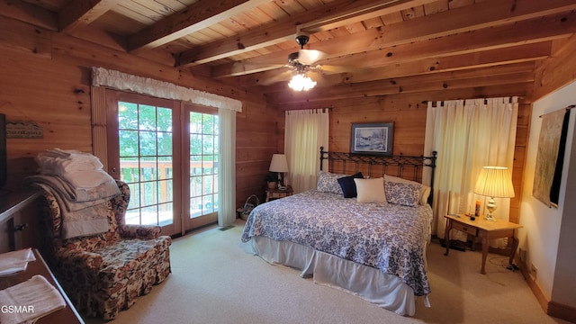 bedroom featuring light carpet, wooden walls, wood ceiling, beamed ceiling, and access to outside