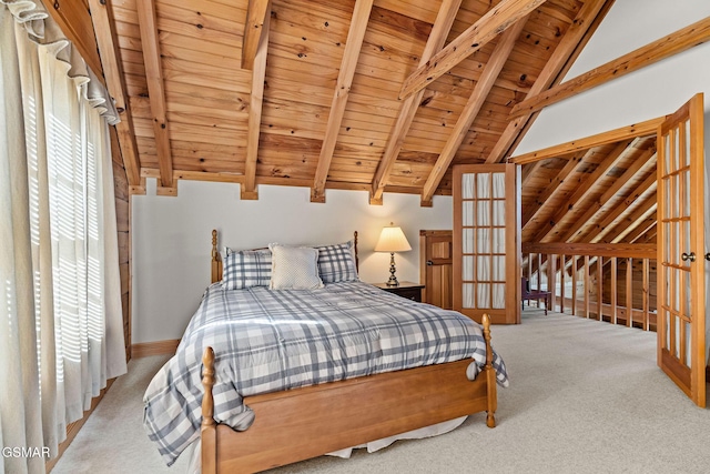 bedroom featuring wood ceiling, lofted ceiling with beams, and carpet floors