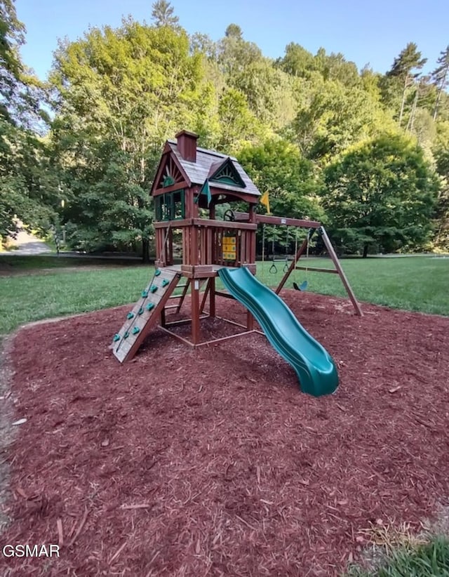 view of playground featuring a lawn