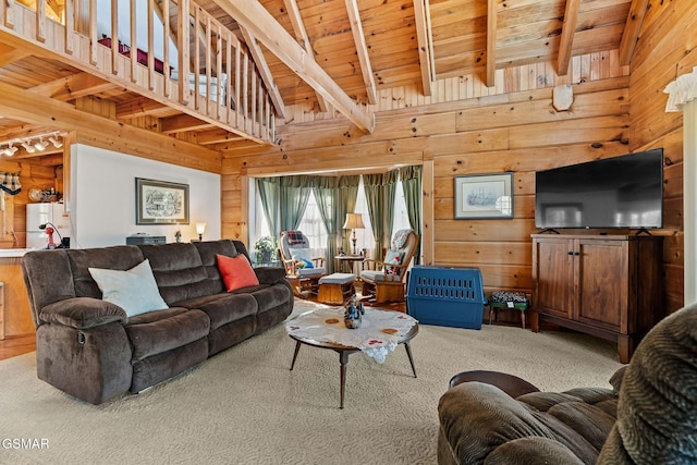 living room with wooden ceiling, carpet flooring, beam ceiling, and wooden walls