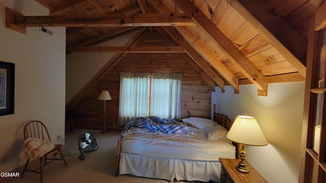 carpeted bedroom with vaulted ceiling with beams, wooden ceiling, and visible vents