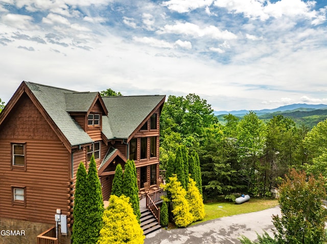 cabin featuring a mountain view