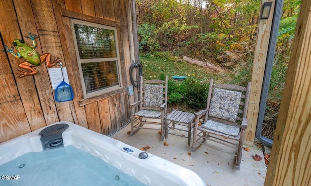 view of patio / terrace featuring a hot tub