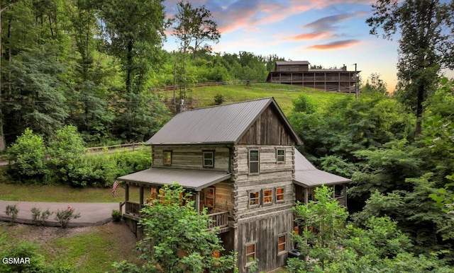 view of outdoor structure at dusk