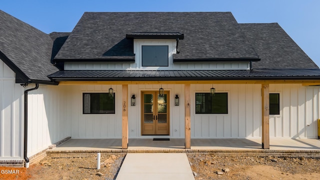 206 Eagle View Dr, Dandridge, TN 37725 - doorway to property featuring covered porch, board and batten siding, and a metal roof