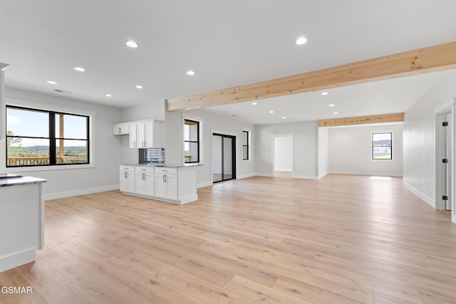 206 Eagle View Dr, Dandridge, TN 37725 - unfurnished living room with light wood-style floors, recessed lighting, and beamed ceiling