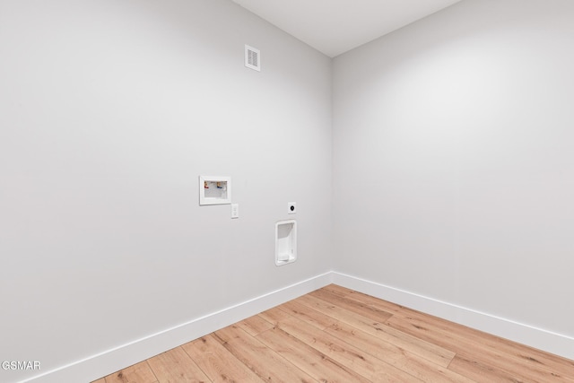 206 Eagle View Dr, Dandridge, TN 37725 - washroom featuring washer hookup, electric dryer hookup, and light wood-type flooring