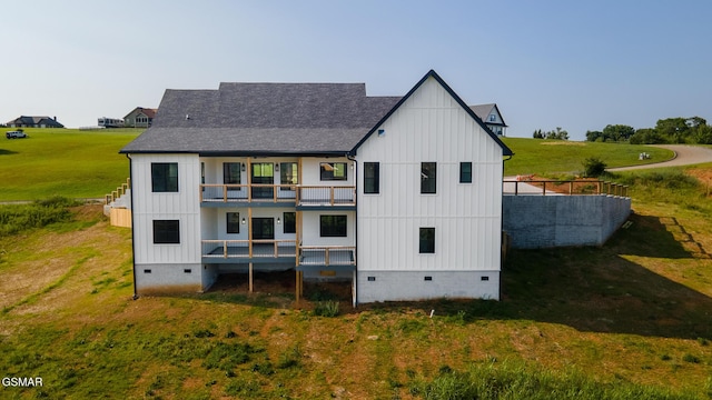 206 Eagle View Dr, Dandridge, TN 37725 - back of house featuring crawl space, a balcony, a lawn, and board and batten siding