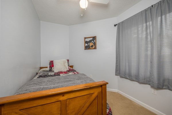 bedroom with carpet and ceiling fan