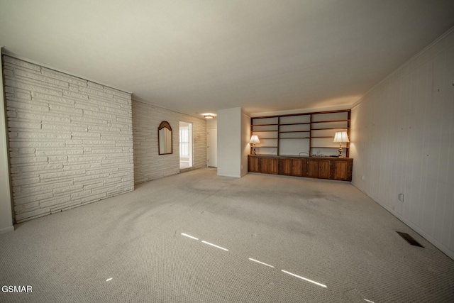 unfurnished room featuring carpet floors