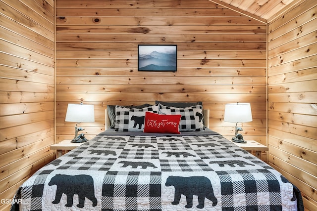 bedroom with lofted ceiling