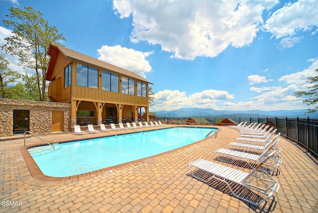 2326 Top Of The World Dr, Sevierville, TN 37876 - community pool featuring a patio and a mountain view