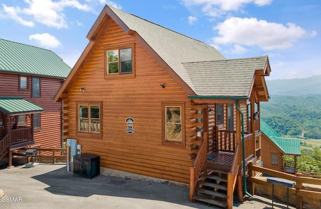 2326 Top Of The World Dr, Sevierville, TN 37876 - back of property featuring log exterior, a mountain view, and roof with shingles