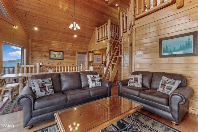 2326 Top Of The World Dr, Sevierville, TN 37876 - living area with wooden walls, wood finished floors, wood ceiling, high vaulted ceiling, and recessed lighting