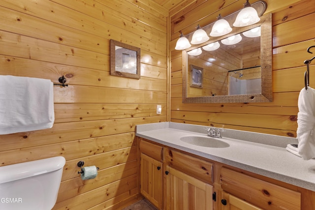 2326 Top Of The World Dr, Sevierville, TN 37876 - bathroom featuring wooden walls, vanity, and a shower with shower curtain