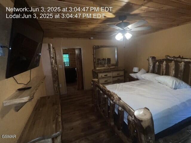 414 Swaying Pines Dr, Sevierville, TN 37876 - bedroom with wooden ceiling and wood finished floors