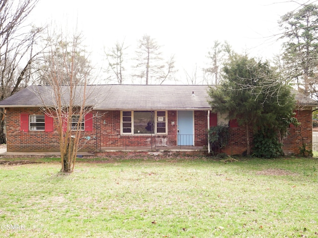 ranch-style house with a front lawn