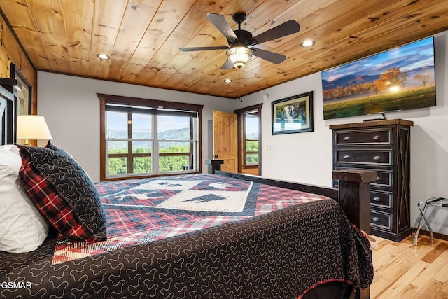 bedroom featuring a ceiling fan, recessed lighting, wooden ceiling, light wood finished floors, and baseboards