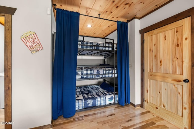 details featuring recessed lighting, wood ceiling, baseboards, and wood finished floors