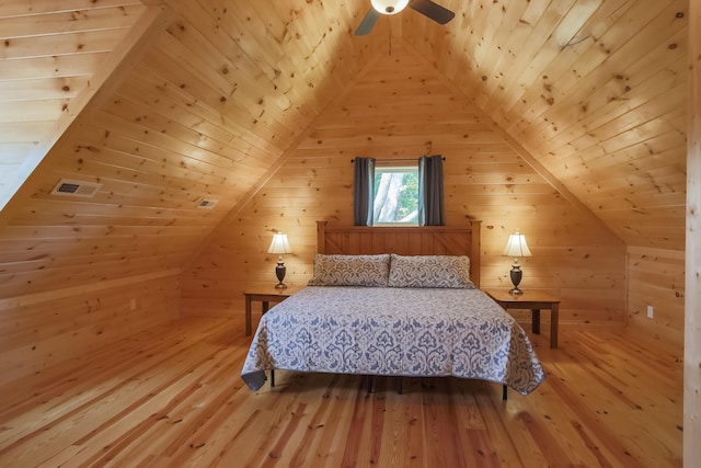 bedroom with hardwood / wood-style floors, ceiling fan, lofted ceiling, and wood ceiling