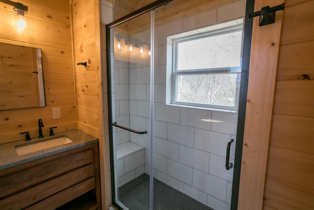 bathroom with vanity and an enclosed shower