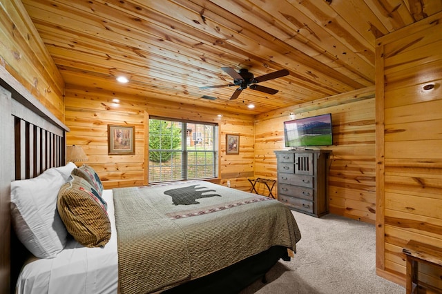 carpeted bedroom with wooden walls, recessed lighting, and wood ceiling