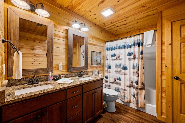 bathroom with wooden ceiling, toilet, wood walls, and a sink