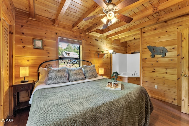 1926 Bird Hill Rd, Sevierville, TN 37876 - bedroom featuring wood finished floors, beam ceiling, wooden ceiling, and wooden walls