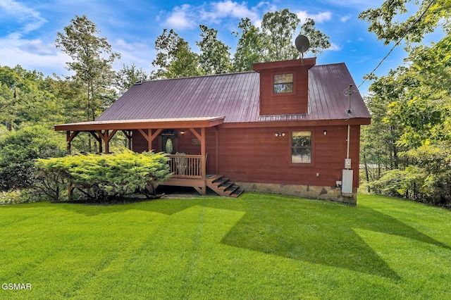 1926 Bird Hill Rd, Sevierville, TN 37876 - view of front of home with a front yard and metal roof
