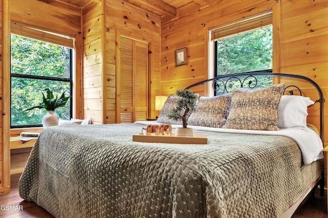 1926 Bird Hill Rd, Sevierville, TN 37876 - bedroom with wooden walls and wood finished floors