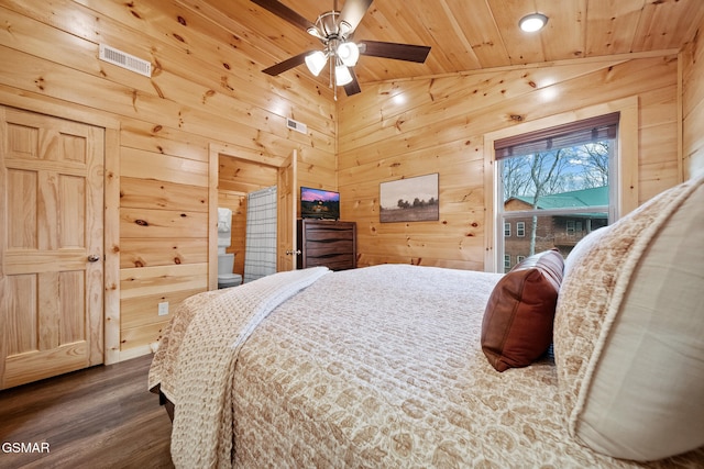 2939 Fiddlers Creek Way, Pigeon Forge, TN 37863 - bedroom featuring wood walls, wood finished floors, and wooden ceiling