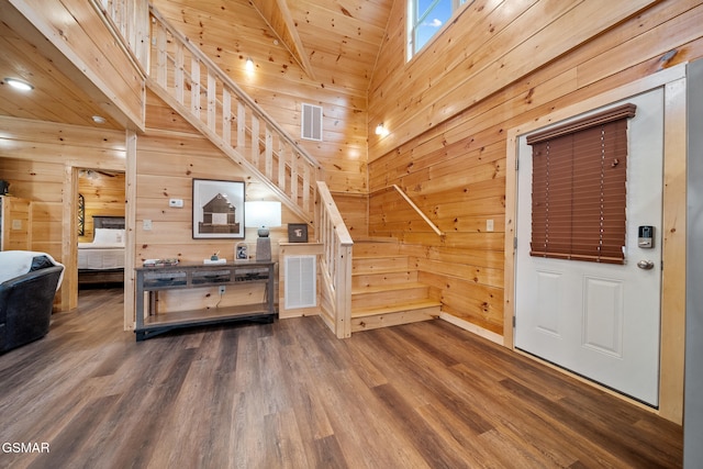 2939 Fiddlers Creek Way, Pigeon Forge, TN 37863 - foyer entrance with wooden walls, wood finished floors, stairway, wood ceiling, and baseboards