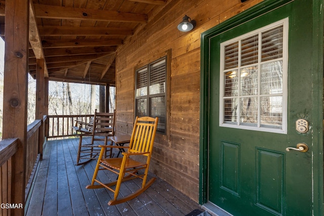 wooden deck featuring a porch