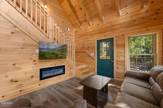 living room featuring beamed ceiling, high vaulted ceiling, wood walls, wood ceiling, and hardwood / wood-style flooring